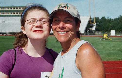 Dr. Lepore smiling with a girl