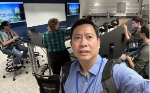 Dr. Linh Ngo and Students in a classroom