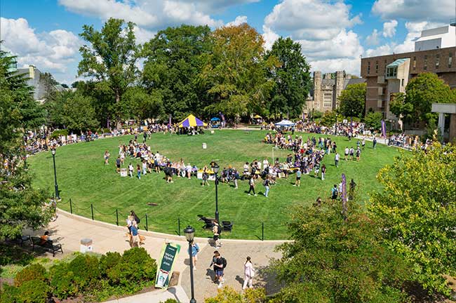 3 female Students at football game