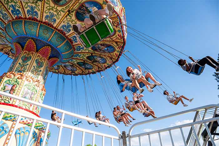 Students on the swings at the 2025 Ramboree