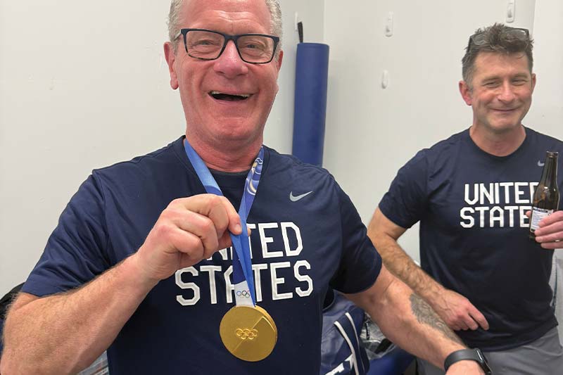 Nick Fanelli ’06 and John Worley ’80 at the 2026 Olympics