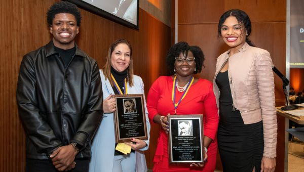 (L-R) MLK Brunch student co-host Josef Sanders, Drum Major for Justice Milena Oberti Lanz M’13, Drum Major for Justice Nicole Barkley-Jones ’99, and MLK Brunch student co-host Journey Washington