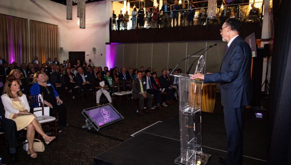 West Chester University President Christopher M. Fiorentino accepts the Chester County Economic Development Council’s Chester County Hall of Fame award Wednesday night.