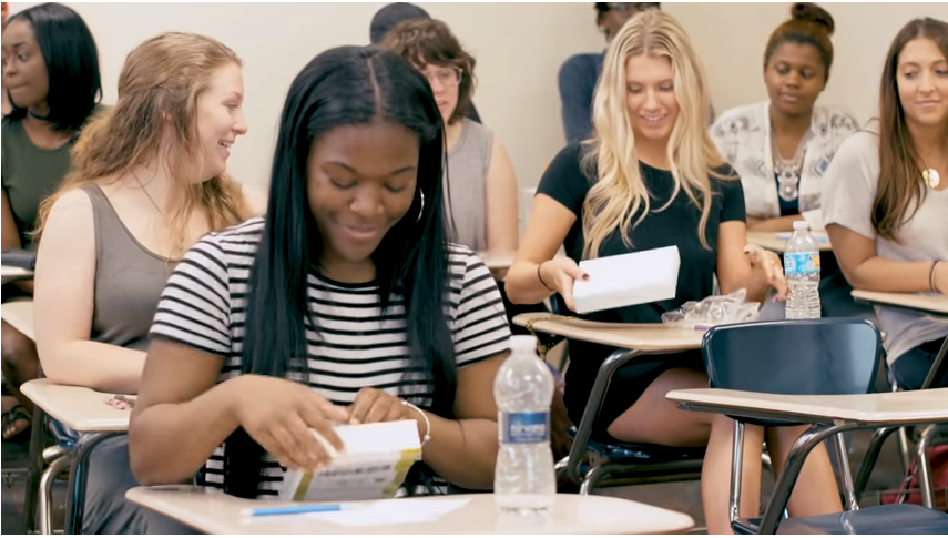 Thumbnail of students taking Ancestry DNA test