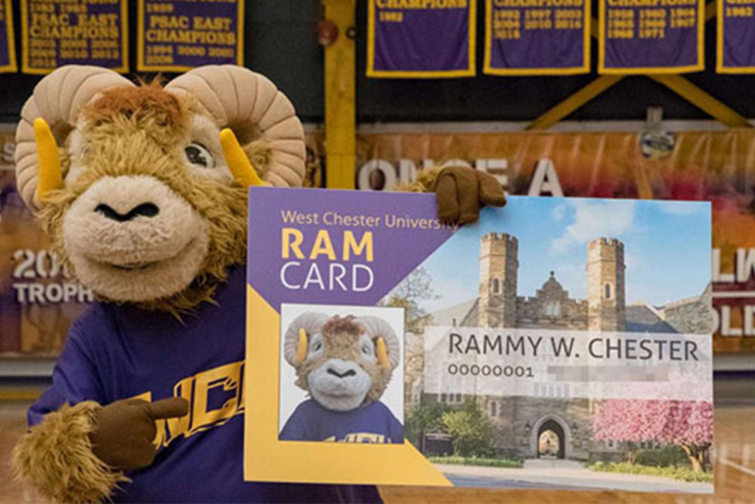 Rammy holding a Ram Card