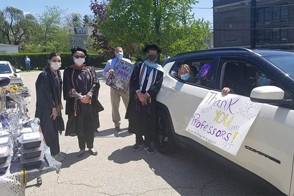 Health Students Infornt of and gowns