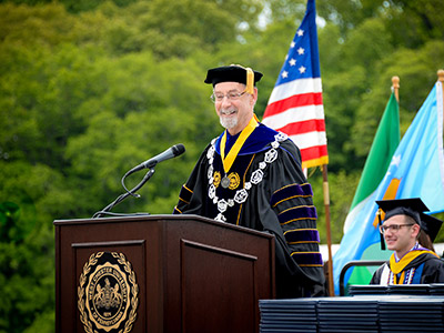Presdient Fiorentino presenting at commencment