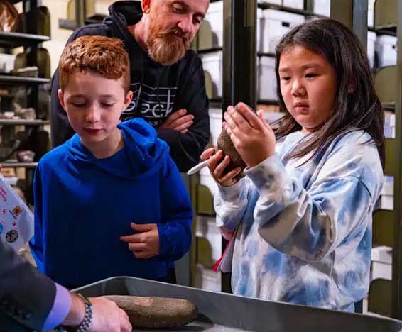 2 young kids playing with legos