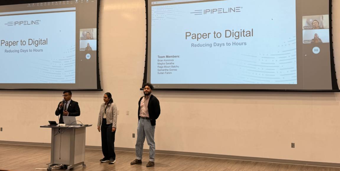 Students presenting on stage