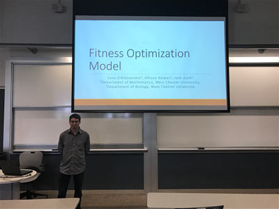 Lane standing in front of presentation