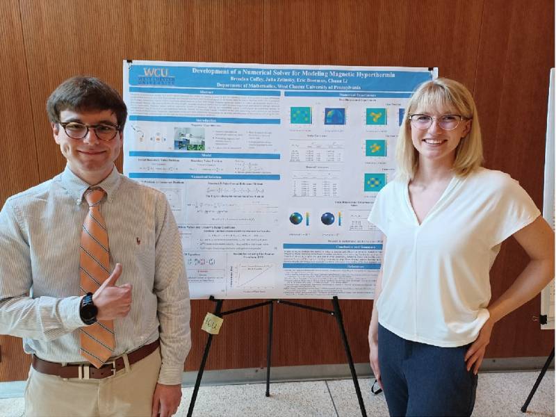 Brendan and Julia with their poster